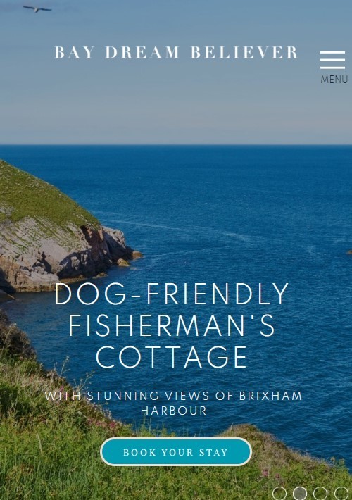 A responsive web design displaying a dog friendly fisherman's cottage on mobile.